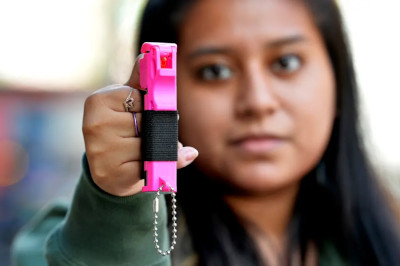 Woman Holding Pepper Spray